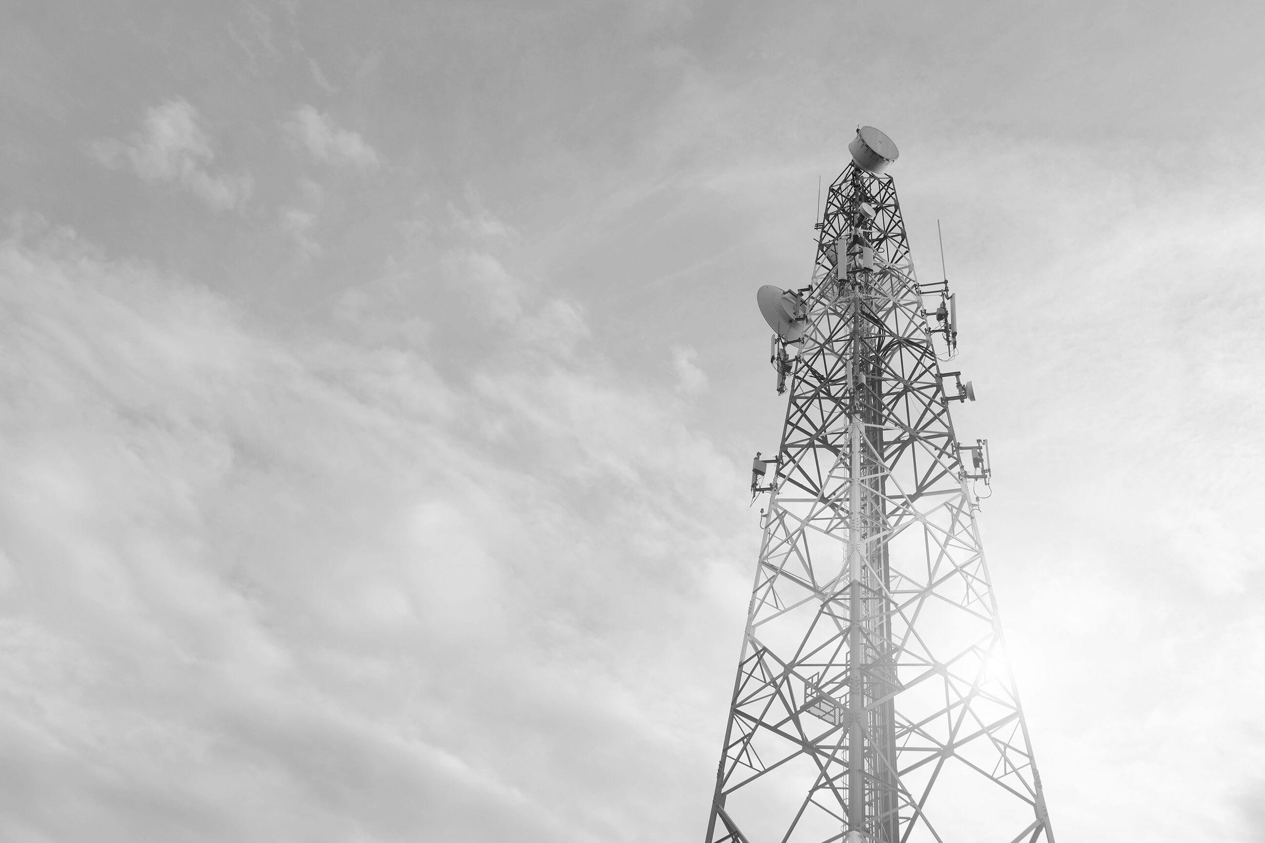 Radio broadcasting. Low-angle view of a telecommunications broadcasting tower.